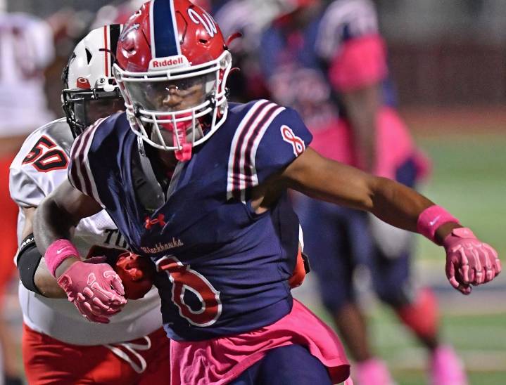 Football: Bryce Riley, West Aurora ease past East Aurora