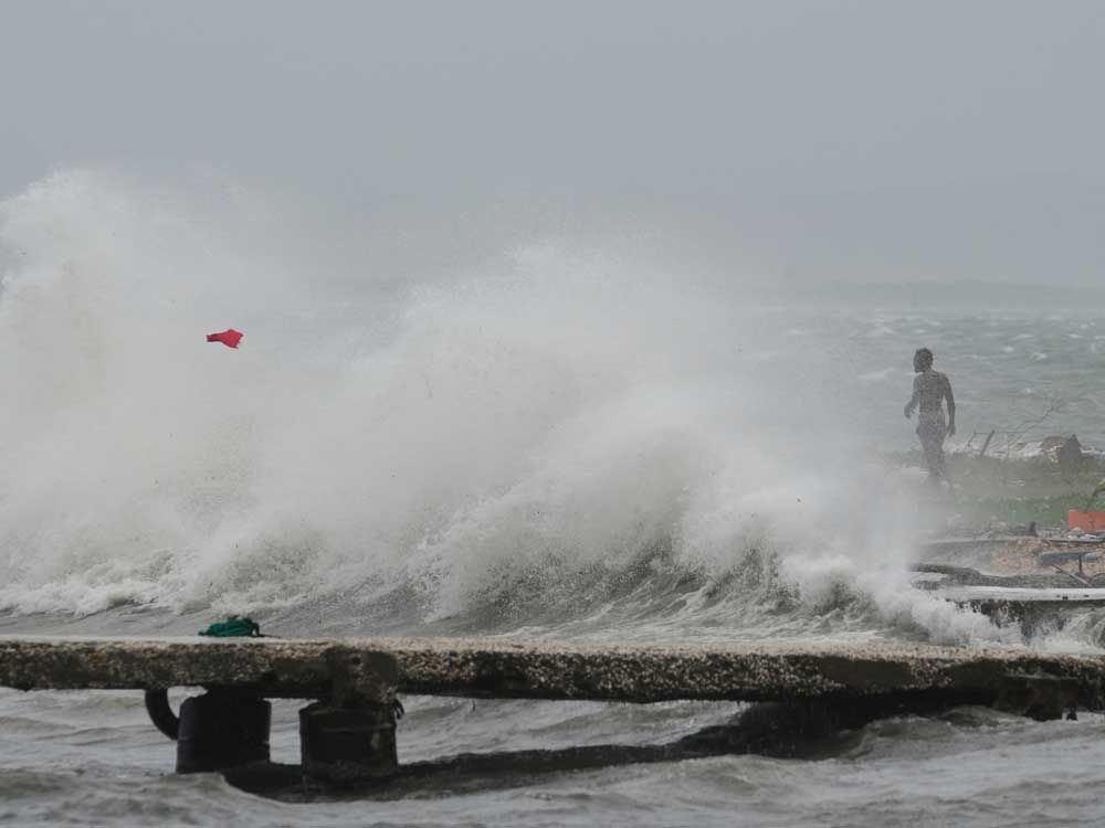 Hurricane Melissa, record storm surge sets sights on Jamaica