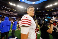 NFL QB saw dead body at team hotel prior to win: Report