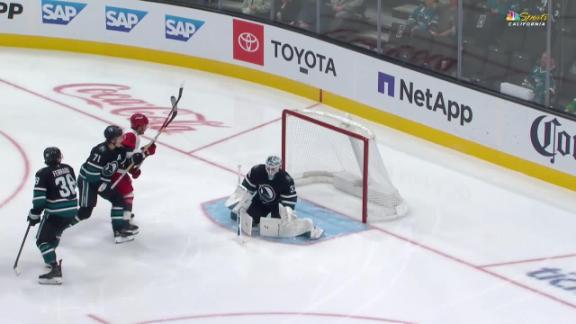 Carrier, Robinson score late in 2nd period and Hurricanes beat Shar...