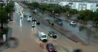 Stormy weather in Las Vegas leads to flood alerts, power outages, flight delays