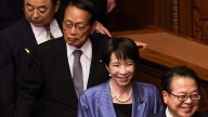 Sanae Takaichi elected Japan's premier, shattering glass ceiling with hard