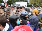 Anti-ICE protesters, police scuffle at Chicago facility