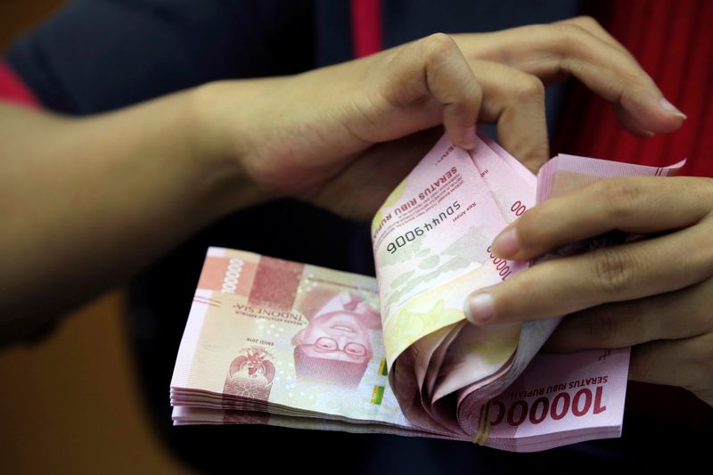 Asian bond outflows in September hit 3-1/2-year high on slowdown concerns