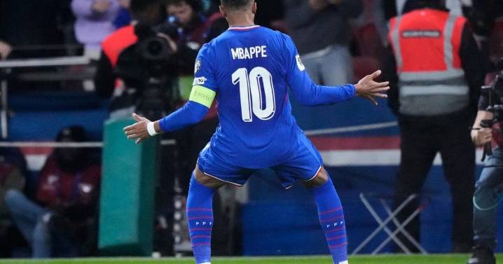 Mbappé scores but limps off late in France's World Cup qualifying win. Germany gets boost