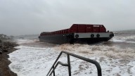 Barges run ashore on Woodmont Beach in Milford