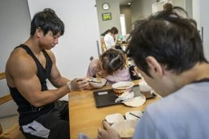 Young bodybuilders lift Japan’s ailing care sector