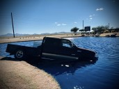 Pickup truck plunges into pond in Amarillo Creek