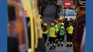 Building collapse in central Madrid kills 2 workers, 2 more missing in the debris