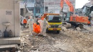 Indonesian rescuers search for missing students after school collapse kills 49