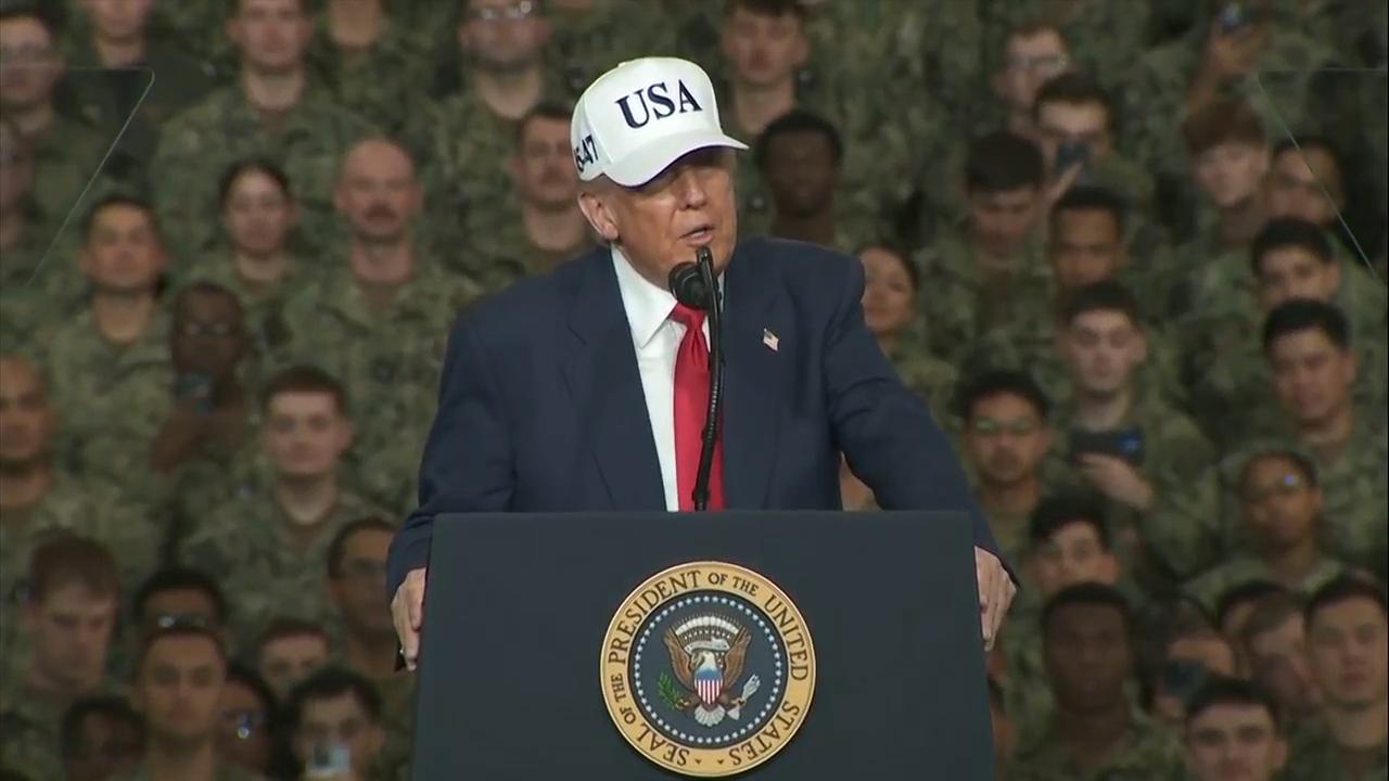 Trump speaks to US Navy personnel on board aircraft carrier docked in Japan