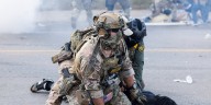 Using helicopters and chemical agents, immigration agents become increasingly aggressive in Chicago