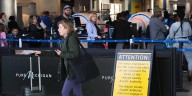 Flight disruptions continue as air traffic controllers brace for their first full missing paychecks