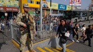 Military and police patrol streets of Peru's capital as state of emergency begins