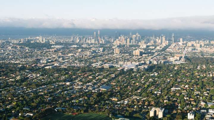 Aussie suburbs where one train stop makes houses over $1million cheaper