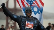 Batman Raises the Flag for the Bibas Children Murdered by Hamas
