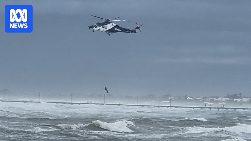 Two dead as severe weather across Victoria downs trees, cuts power and postpones Geelong Cup