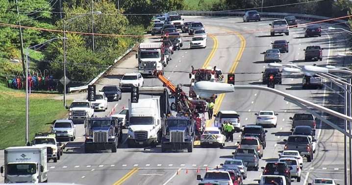 All inbound lanes at Sir Barton Way closed due to broken down semi