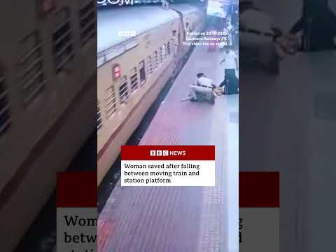 Woman saved after falling between moving train and station platform in India. #Trains #BBCNews