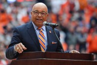 Syracuse alum Mike Tirico’s play-by-play of this Bills fan’s great escape with Josh Allen’s football has everyone in stitches