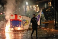 Georgia’s ruling party claims landslide win in local vote boycotted by main opposition