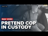 Video shows accused police impersonator tell Seattle firefighters to get away from body