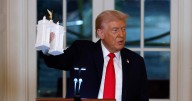 Trump unveils model of triumphal arch to business titans at White House ballroom fundraiser