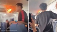Viral video: Panic mid-air as Air China flight diverts after passenger’s lithium battery bursts into flames