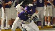 Watertown's Lincoln Schutt walks into the end zone against Sturgis