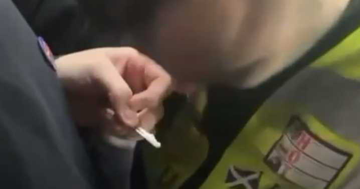 Hibs v Rangers security guard filmed snorting white powder during match