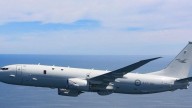 Chinese jet releases flares near RAAF plane in South China Sea