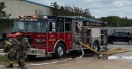 Firefighters work to put out fire at Florence industrial building