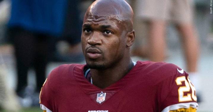 Former NFL star Adrian Peterson arrested in Houston suburb on DWI and gun charges