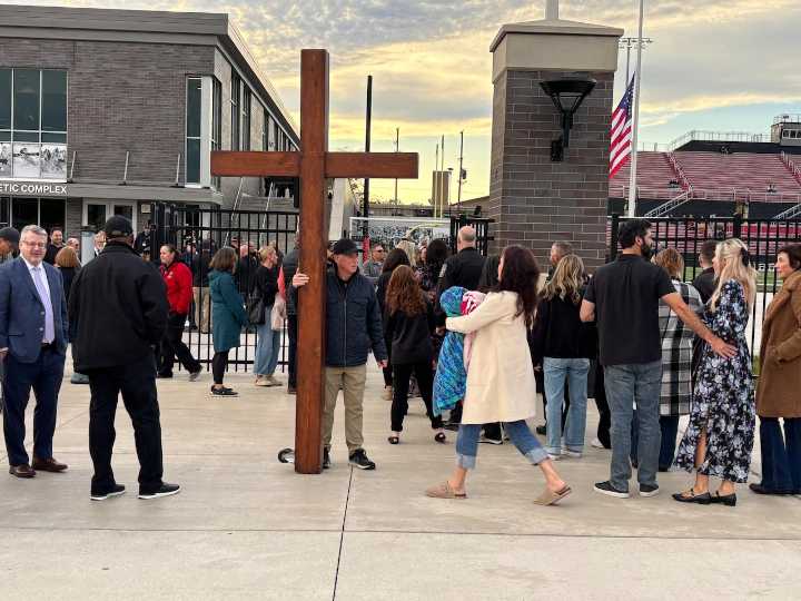 Hundreds unite at Grand Blanc High School vigil after deadly church attack