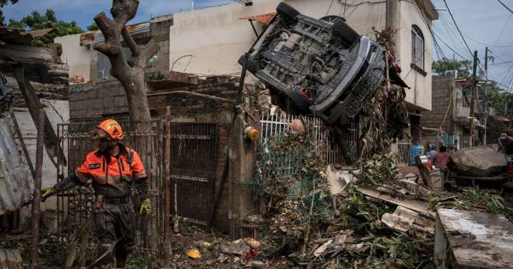 Death toll from torrential rains in Mexico rises to 64 as search expands