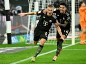 Bayern beat 10-man 'Gladbach to match European record