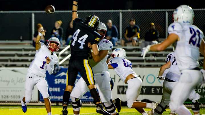 See Cade Young throw four touchdowns in West Henderson…