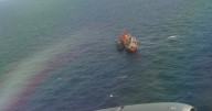 CBS News gets inside look at mission tracking North Korean ships and China's response