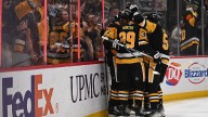 NHL fan hospitalized after fall from upper concourse of Penguins' arena