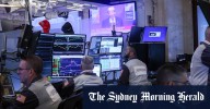 ASX to edge lower after volatile Wall Street session; Macquarie’s $61.4b AI deal