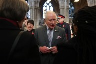 Britain's King Charles heckled over brother Prince Andrew