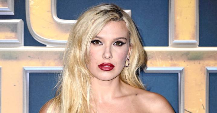 Millie Bobby Brown Wore A Plunging White Top To Promote Her New Lippie