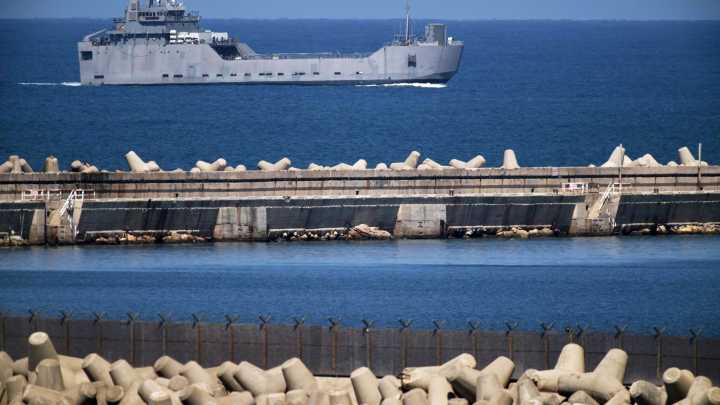 Israeli navy intercepts most flotilla boats and arrests activists. A single boat stops nears Gaza