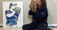 Artist uses baseball bats and balls to create paintings of Blue Jays