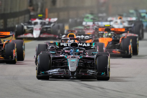 George Russell wins F1's Singapore GP as McLaren secures constructors' title