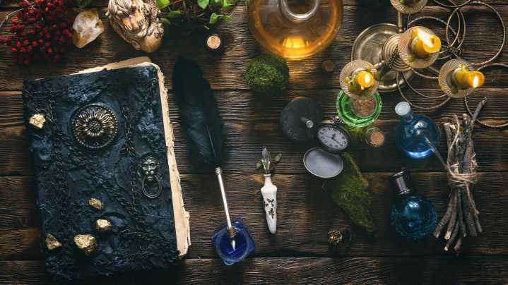 DIY A Giant Hocus Pocus-Inspired Spellbook With Dollar Tree Items