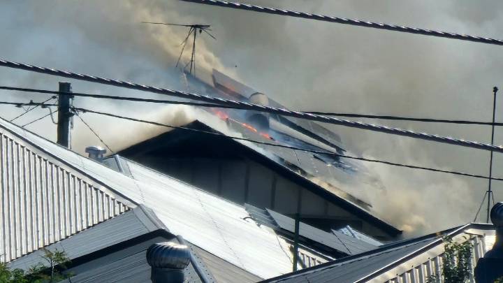 Ten fire crews battle fierce flames after a two-storey home in Brisbane’s inner east was engulfed