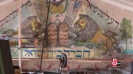 Forgotten Jewish mural restored and relocated after decades in attic
