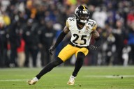 Elliott not traveling with team to Cincinnati