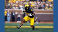 Michigan takes advantage of Washington turnovers, pulls away to win 24
